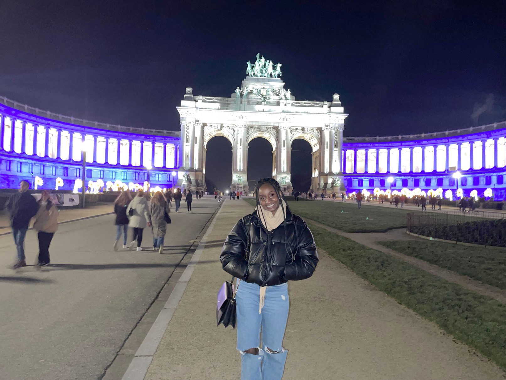 Natalie France poses in Brussels city center at night