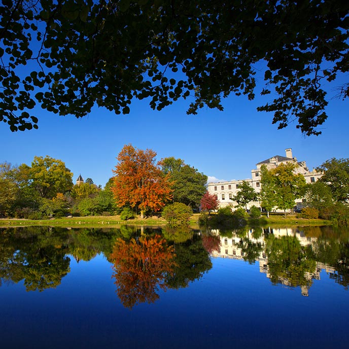 The Memorial Union reflected in the calm waters of Lake LaVerne