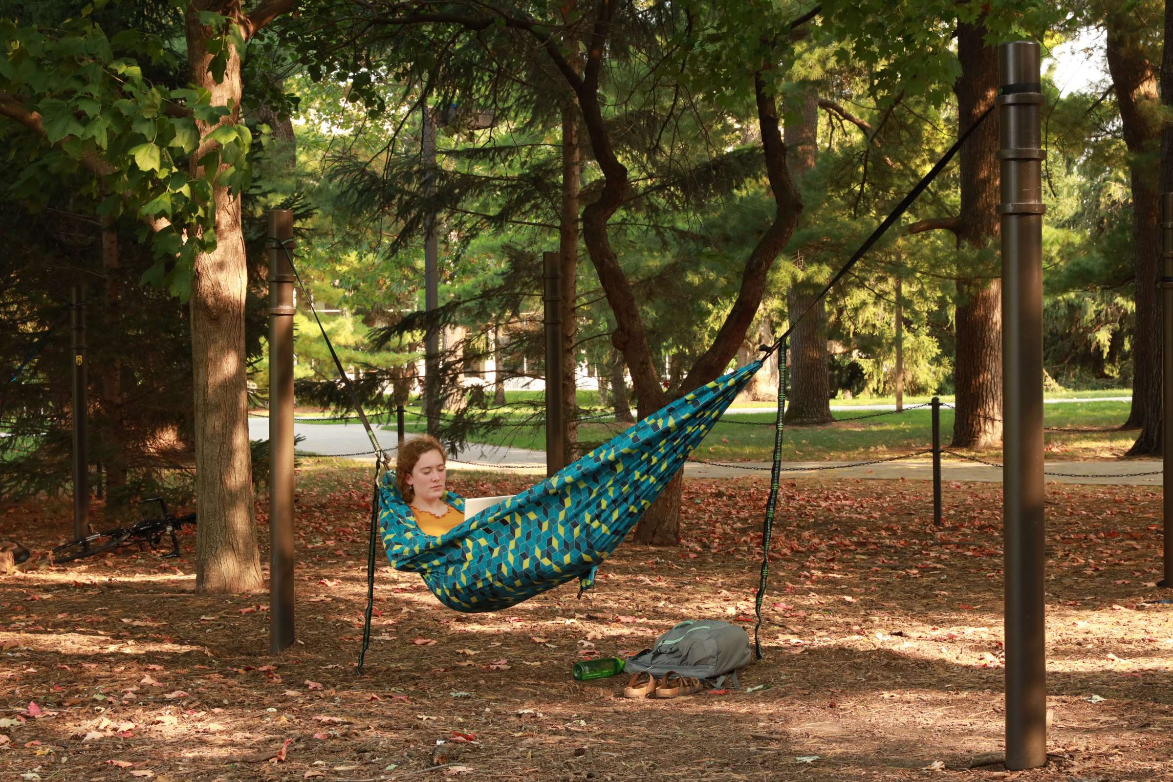 Student reading in hammock. 